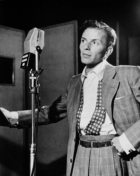 Frank Sinatra at a recording session microphone, 1947